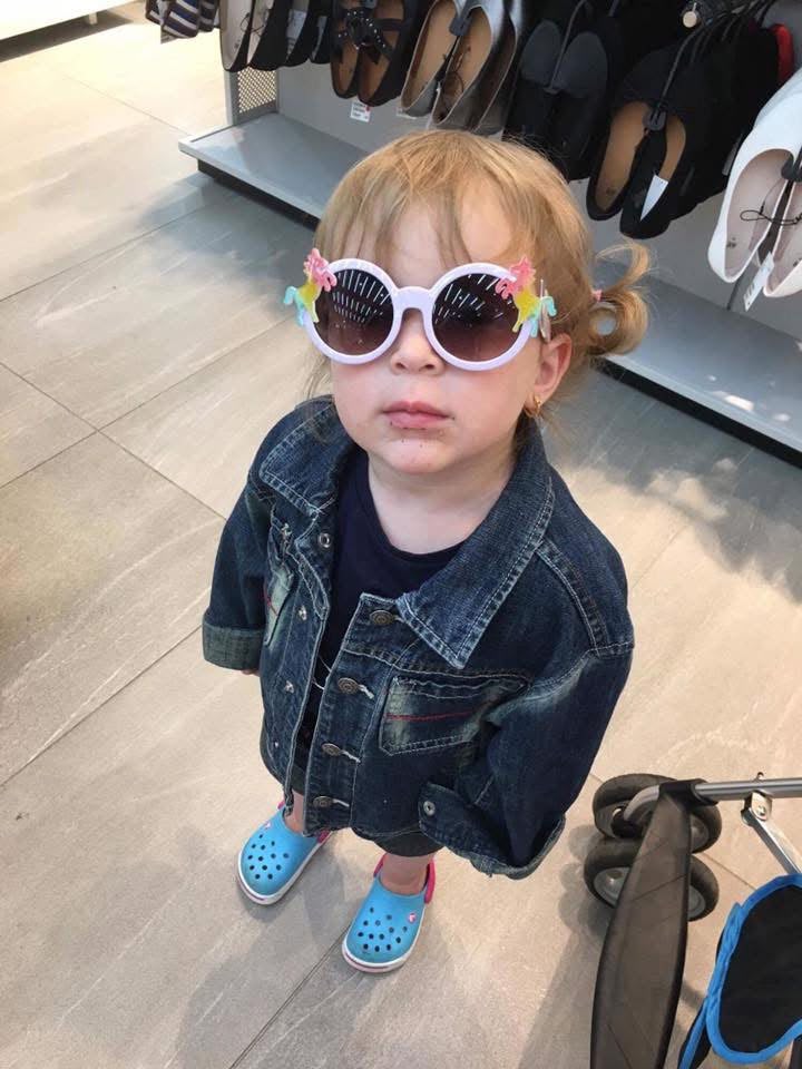 Little Sham in unicorn sunglasses
