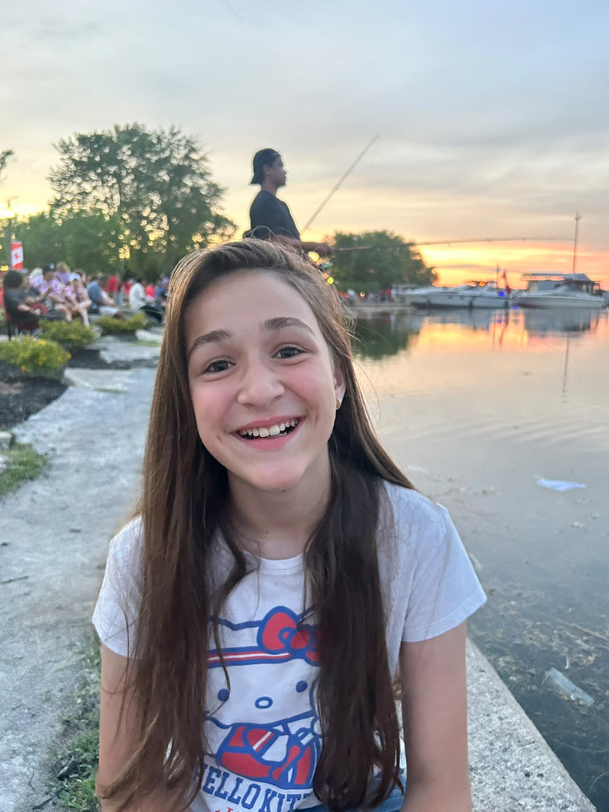 Sham laughing at the harbour at sunset